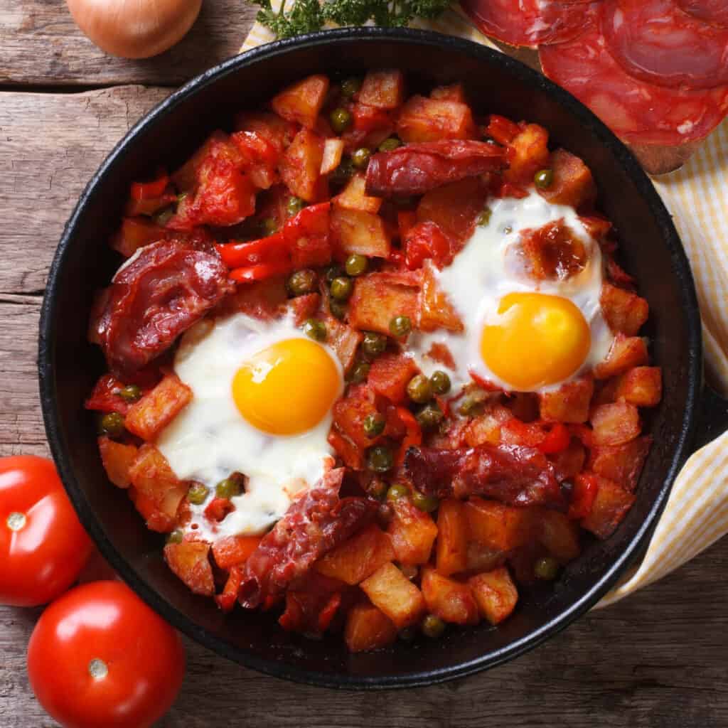 Baked Eggs with Free Range Spicy Spanish Chorizo Sausages Image