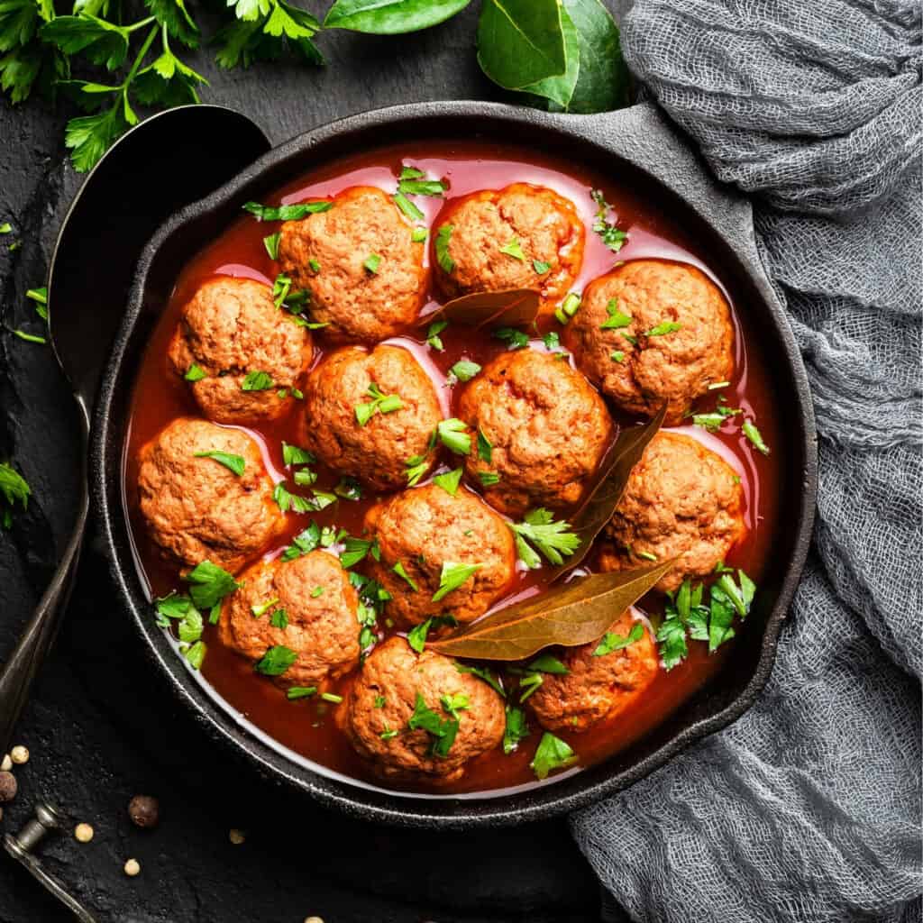 The Meat Club meatballs in tomato sauce Image